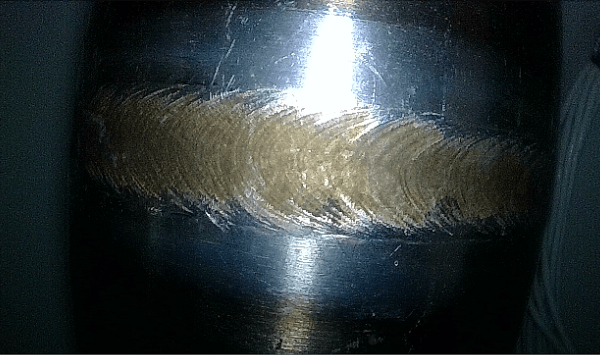 Close-up metal scratch inspection captured by Yateks narrow FOV endoscope with shallow DOF for micro flaw detection